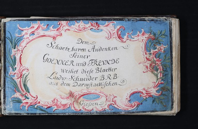 Digitalisat der Titelseite des "Werther-Stammbuchs" mit einer Widmung von Ludwig Schneider an die Einschreiber.